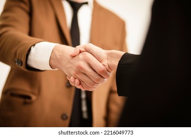 Business Man Hands Shaking ,Successful Businessman Handshake After Good Deal For Both Companies Businessmen Handshaking After Finishing Up Meeting