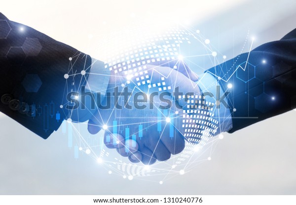 business man handshake with effect global world\
map network link connection and graph chart of stock market graphic\
diagram, digital technology, internet communication, teamwork,\
partnership concept