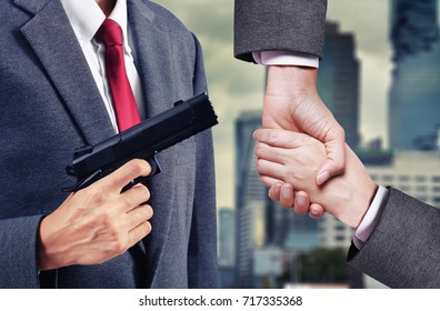 Business Man Hold Gun