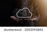 Business man hold,holding cloud computing data and security on global networking,Padlock and cloud icon. Technology of business.Cybersecurity and information or network protection.internet project.