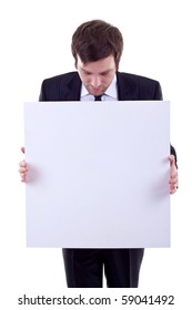 Business Man Holding A Blank Banner And Looking Down To Copy Space