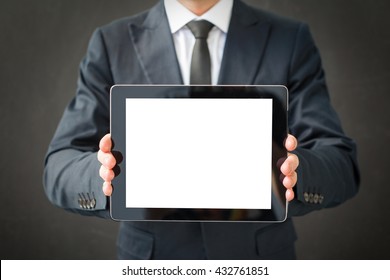 Business Man Holding Blank Screen Tablet 