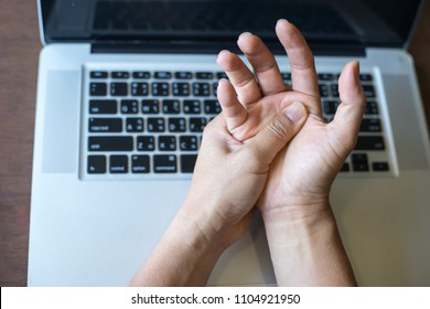 Business Man Holding Her Wrist Pain From Using Computer.,Hand Pain