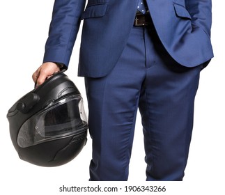 Business man holding motorbike helmet with blue suit and tie isolated in white background - Shutterstock ID 1906343266