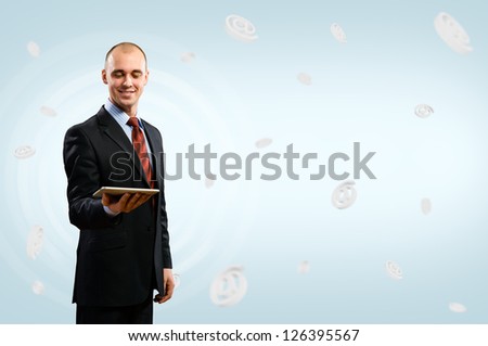 business man holding a tablet, fly around the signs e-mail