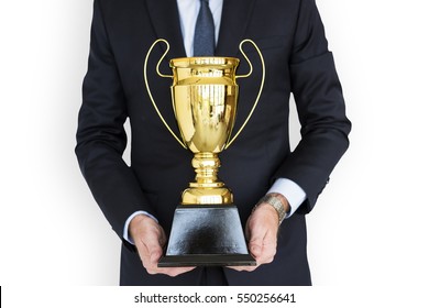 Business Man Holding Trophy Award