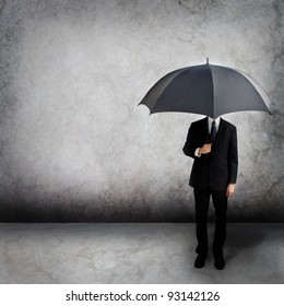 Business Man Holding An Umbrella