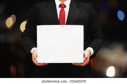 Business Man Holding White Box