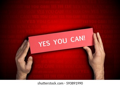 Business Man Holding Yes You Can! Sing