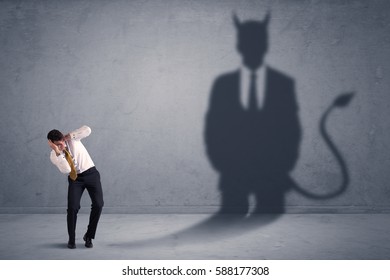 Business Man Looking At His Own Devil Demon Shadow Concept Background