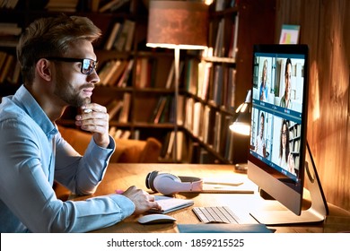 Business man meeting virtual team on video conference call using computer. Social distance worker working from home office in remote videoconference online chat, watching webinar, making videocall. - Shutterstock ID 1859215525
