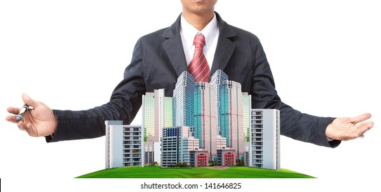 Business Man And Modern Building On Green Grass Field Use For Land Management Theme