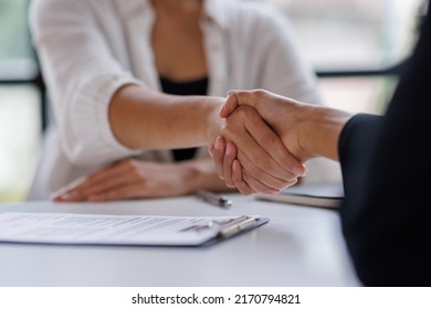 Business man offer and give hand for handshake in office. Successful job interview. Apply for loan in bank. Salesman, bank worker or lawyer shake for deal, agreement or sale. Increase of salary. - Shutterstock ID 2170794821