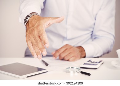 Business Man Offering Handshake