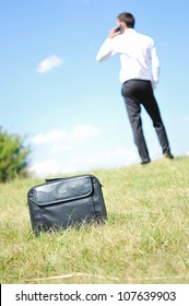 Business Man With Phone In Nature