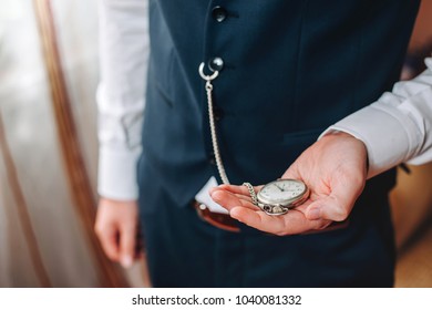 Business man with pocketwatch