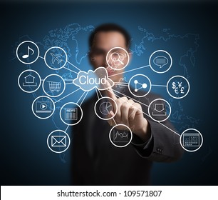 business man pointing at cloud computing and connected world wide application network