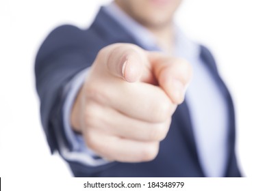 Business man pointing finger at you, isolated on white