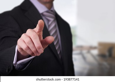 A Business Man Pointing His Finger At You.