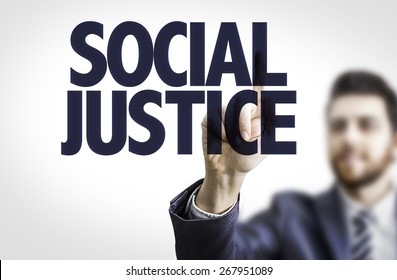 Business Man Pointing The Text: Social Justice