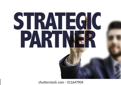 Business man pointing the text: Strategic Partner
