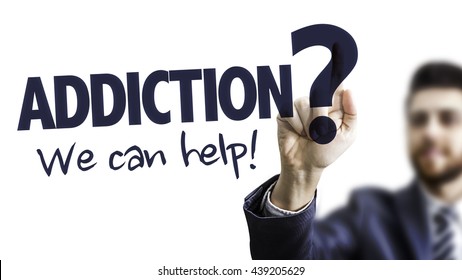 Business Man Pointing The Text: Addiction? We Can Help!