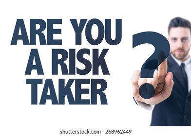 Business man pointing the text: Are You a Risk Taker?