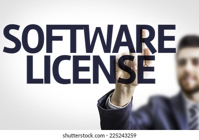 Business man pointing to transparent board with text: Software License