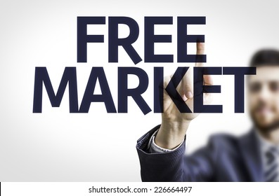 Business Man Pointing To Transparent Board With Text: Free Market