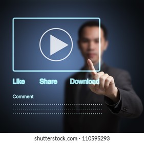 Business Man Pointing At Video Clip On  Social Network Touchscreen