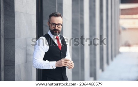 Business man portrait. Confident successful, businessmale or manager, in white shirt hold coffee cup on hand stand near his work office space outdoor, looks directly at camera.