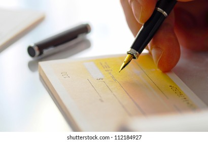 Business Man Prepare Writing A Check