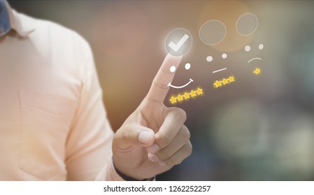 business man pressing smiley face emoticon on virtual touch screen. - Shutterstock ID 1262252257