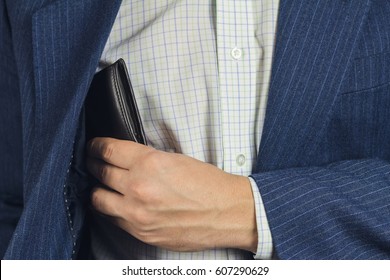 651 Man take wallet from suit Images, Stock Photos & Vectors | Shutterstock