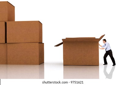 Business Man Pushing A Box - Isolated Over A White Background