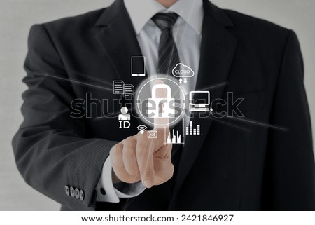 Business man pushing button for business security