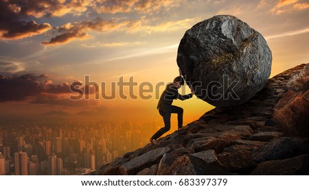 Business man pushing large stone up to hill , Business heavy tasks and problems concept.