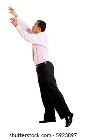 Business Man Reaching Up To Something Imaginary - Isolated Over A White Background