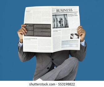 Business Man Reading Newspaper