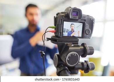 Business Man Recording Video For An Internet Reportage Or Tutorial Streaming