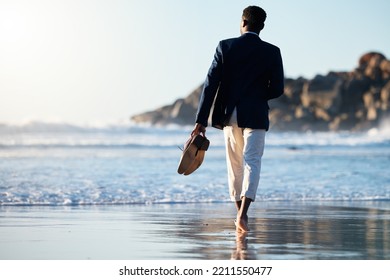 Business Man Relax At Beach, Walking On Sand With Shoes In Hand And Calm Holiday At California Sea. Sunset Waves Break On Weekend, Summer Travel Freedom With Zen Blue Sky And Ocean Vacation Travel