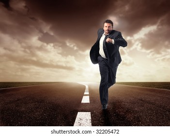 Business Man Running Isolated On The Road