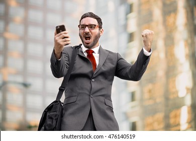 Business man sales celebration elated about financial investment winner successful - Shutterstock ID 476140519