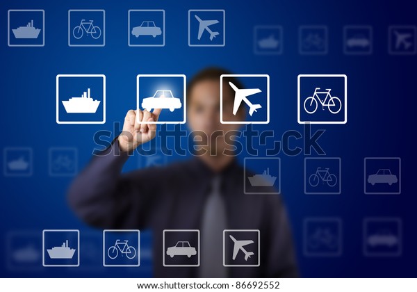 business man select transportation route by\
pushing a car button on touch\
screen