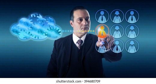 Business Man Selecting A Worker By Touch To Move A Work Process Into The Cloud. Information Technology Concept For Hybrid Cloud Deployment And Transitioning Infrastructure Into A Virtual Ecosystem.