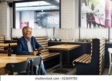 Business Man Senior Using Device Concept - Powered by Shutterstock