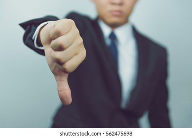 Business Man  Show Thumbs Down