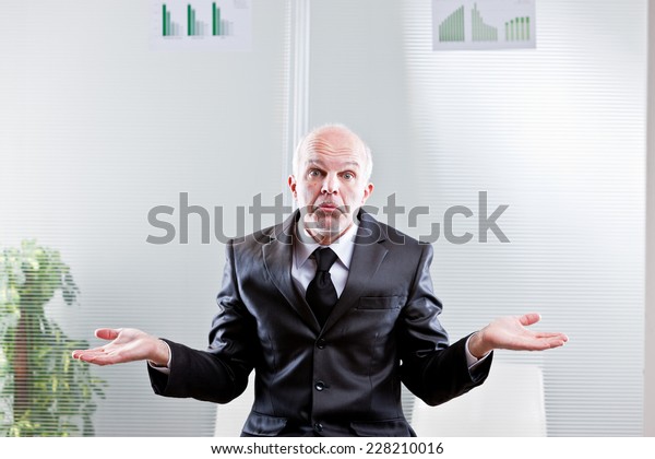 business man showing off empty hands meaning he\
can\'t do nothing