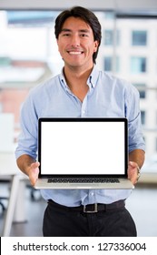 Business Man Showing Something On A Laptop Screen