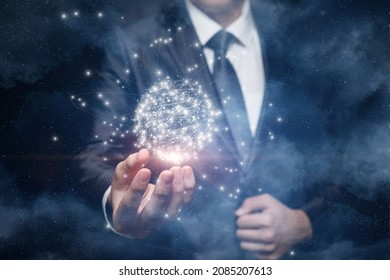 Business man shows the global network on the background of outer space.